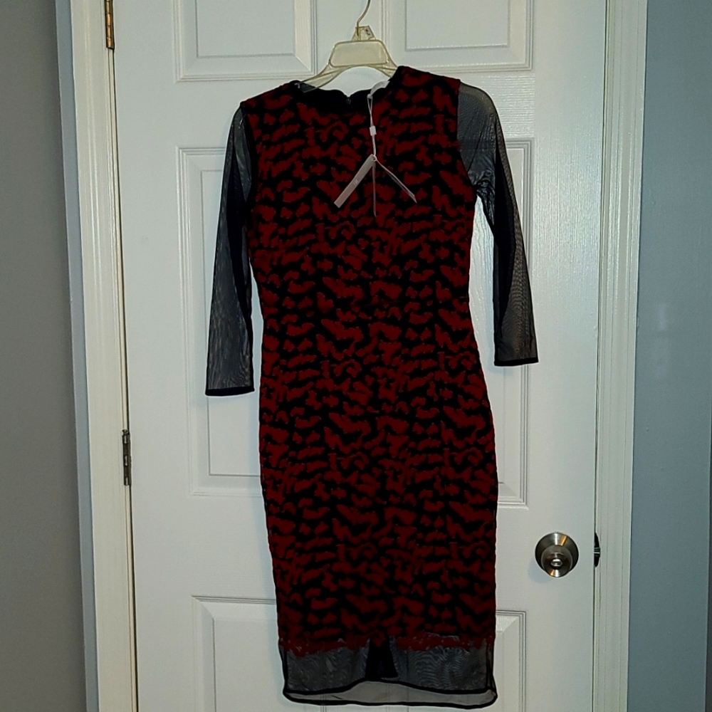 Houndstooth-jersey dress with tulle underskirt and sleeves